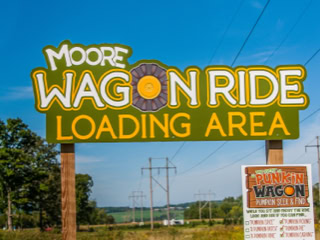 Moore Family Farm Wagon Ride Sign